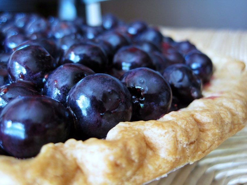 This image has an empty alt attribute; its file name is blueberry-pie-natural-light.jpg